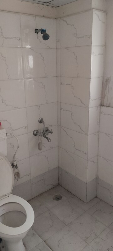 Bathroom in 3 BHK Apartment at Auric City Homes, Sector 82 – for Rent