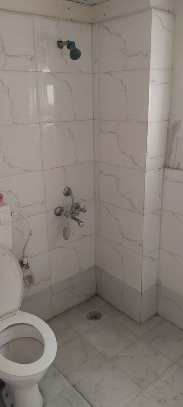 Bathroom in 3 BHK Apartment at Auric City Homes, Sector 82 – for Rent