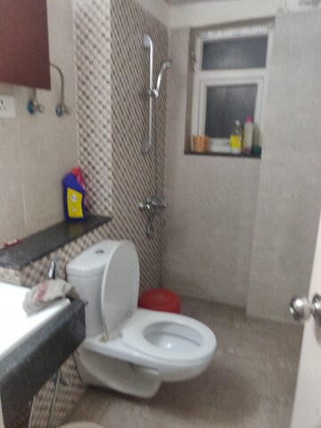 Bathroom in 3 BHK Apartment at Shri Radha Sky Gardens, Sector 16b Greater Noida – for Rent