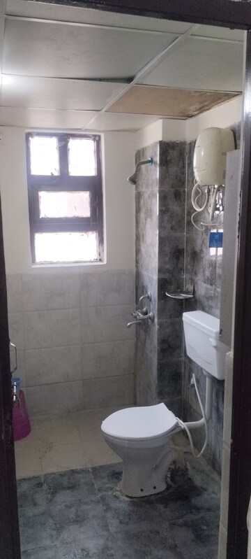 Bathroom in 1 BHK Apartment at Auric City Homes, Sector 82 – for Rent