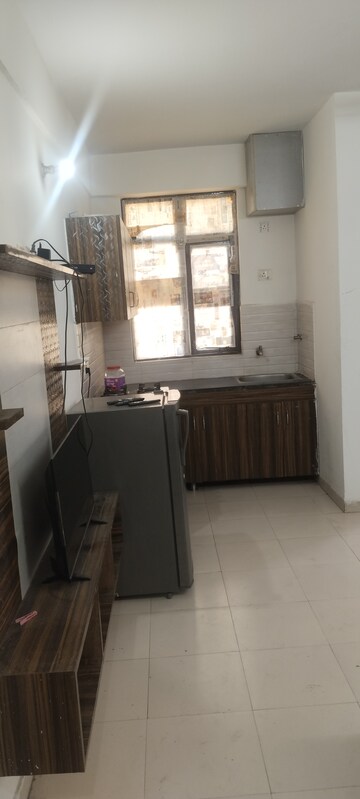 Kitchen in 1 BHK Apartment at Auric City Homes, Sector 82 – for Rent