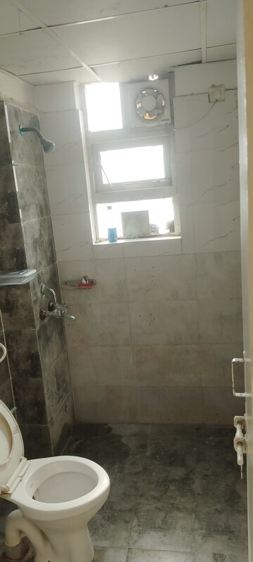 Bathroom in 1 BHK Apartment at Auric City Homes, Sector 82 – for Rent