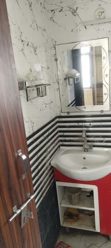 Bathroom in 3 BHK Apartment at Auric City Homes, Sector 82 – for Rent