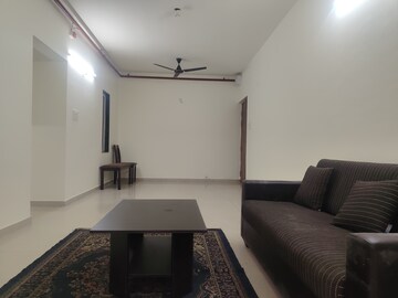 Living Room in 2 BHK Apartment at Indiabulls Greens, New Panvel – for Rent
