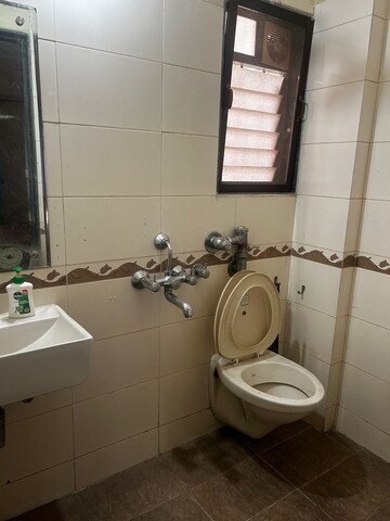 Bathroom in 1 BHK Apartment at Lodha Paradise, Majiwada – for Sale