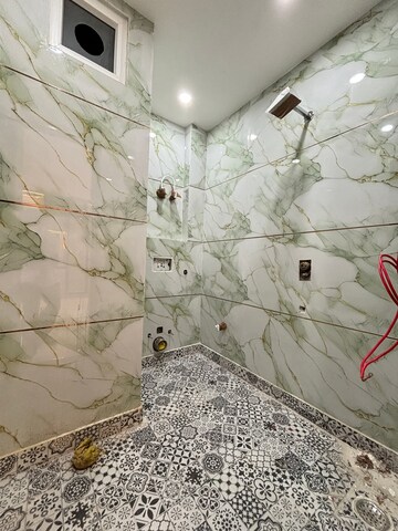 Bathroom in 4 BHK Builder Floor at Freedom Fighters Enclave – for Rent