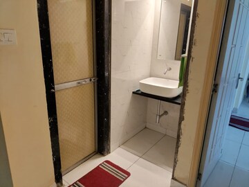 Bathroom in 2 BHK Apartment at Nakshatra Swastik Alps, Brahmand – for Rent