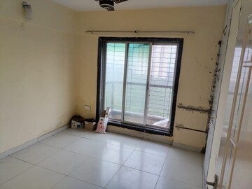 Room in 2 BHK Apartment at Nakshatra Swastik Alps, Brahmand – for Rent