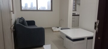 Living Room in 1 BHK Apartment at Group Satellite Elegance, Goregaon East – for Rent