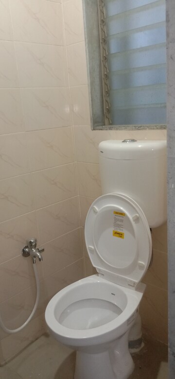 Bathroom in 1 BHK Apartment at Group Satellite Elegance, Goregaon East – for Rent