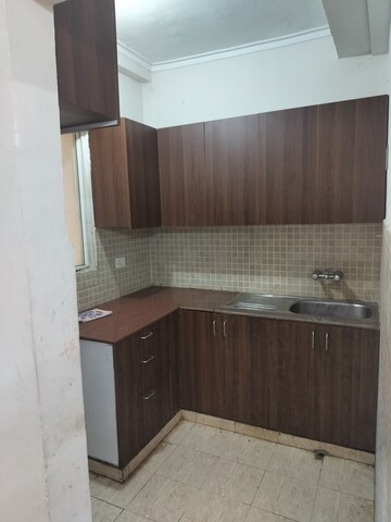 Kitchen in 2 BHK Apartment at Amrapali Golf Homes, Sector 4 Greater Noida – for Rent