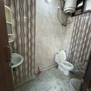 Bathroom in 1 BHK Builder Floor at Kotla Mubarakpur – for Rent