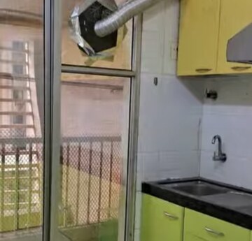 Kitchen in 2 BHK Apartment at Soham Tropical Lagoon, Ghodbunder Road – for Sale