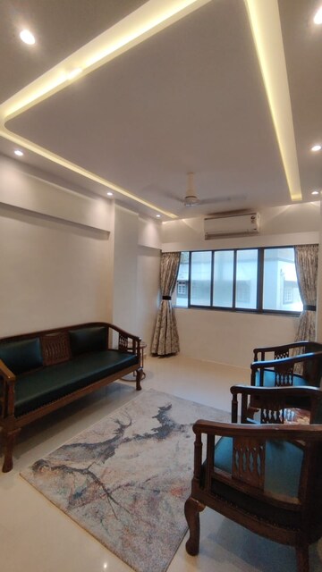 Living Room in 1 BHK Apartment at Beach View Apartment, Bandra West – for Rent