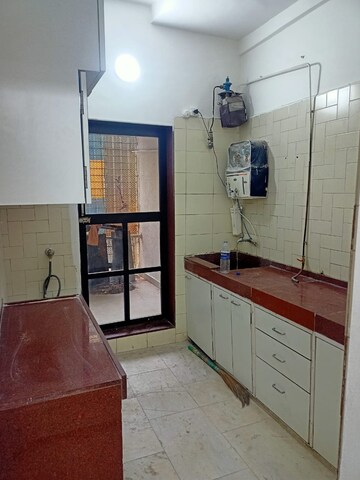 Kitchen in 2 BHK Apartment at Meethi Hill Crest Apartment, Bandra West – for Rent