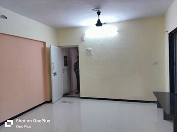 Living Room in 1 BHK Apartment at Gods Heaven CHS, Powai – for Rent