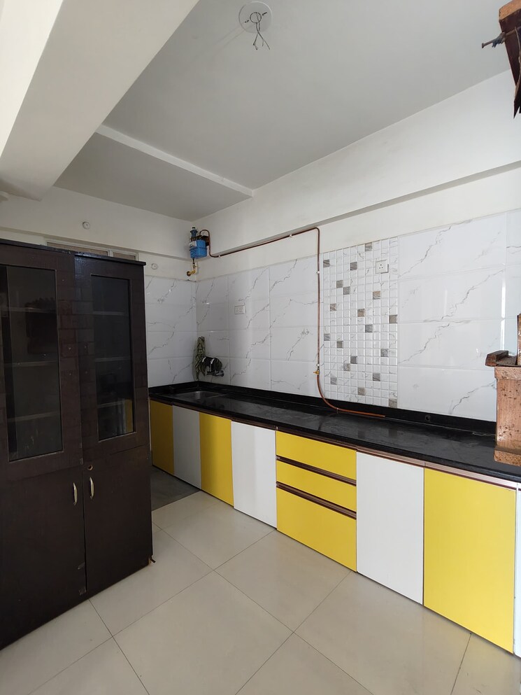 Kitchen, vision-square 1 Bedroom 480 Sq.Ft. Apartment In Wakad Pune 9085124