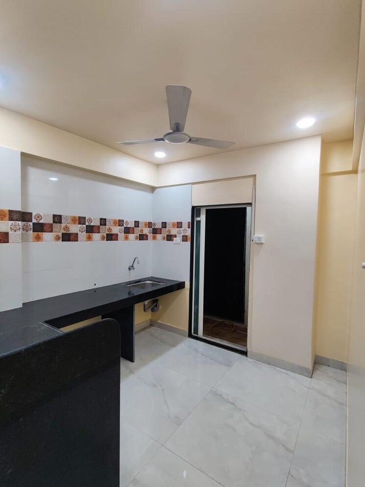 Kitchen, spring-glory-co-operative-society 2 Bedroom 850 Sq.Ft. Apartment In Kharadi Pune 9085159