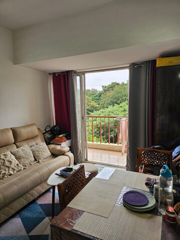 Living Room in 1 BHK Apartment at Mind Space Queenstown, Chinchwad – for Rent