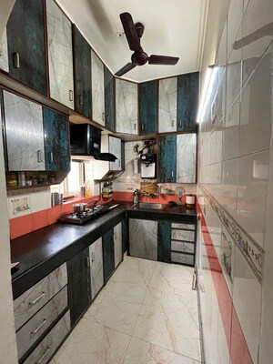 Kitchen in 2.5 BHK Apartment at Uma Cooperative Society, Mayur Vihar 1 – for Sale