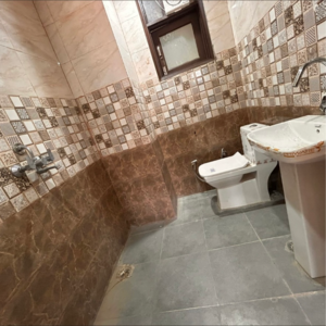 Bathroom in 1 BHK Builder Floor at Chattarpur – for Sale