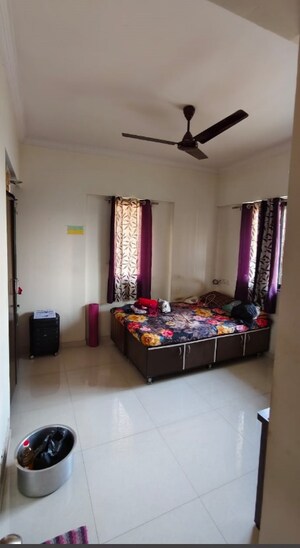 Bedroom in 1 BHK Apartment at Raunak Delight, Owale – for Sale