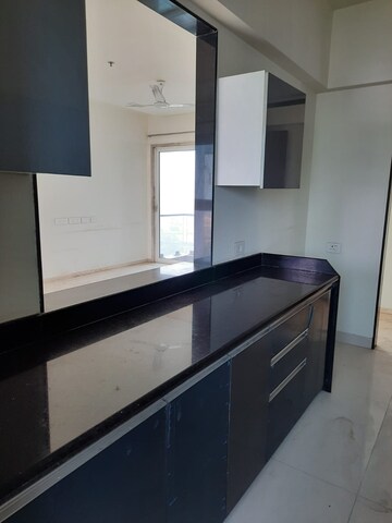 Kitchen in 3 BHK Apartment at Rohan Lifescapes Aquino, Prabhadevi – for Rent