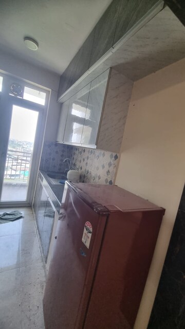 Kitchen in 3 BHK Apartment at Shri Radha Sky Gardens, Sector 16b Greater Noida – for Sale