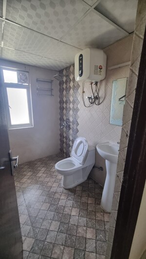 Bathroom in 3 BHK Apartment at Shri Radha Sky Gardens, Sector 16b Greater Noida – for Sale