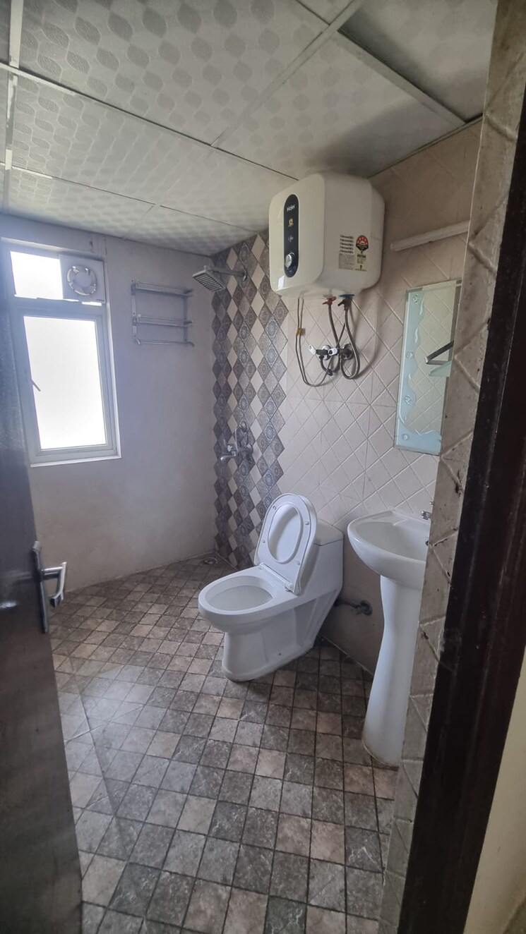 Bathroom, shri-radha-sky-gardens 3 Bedroom 1465 Sq.Ft. Apartment In Sector 16b Greater Noida Greater Noida 9085392