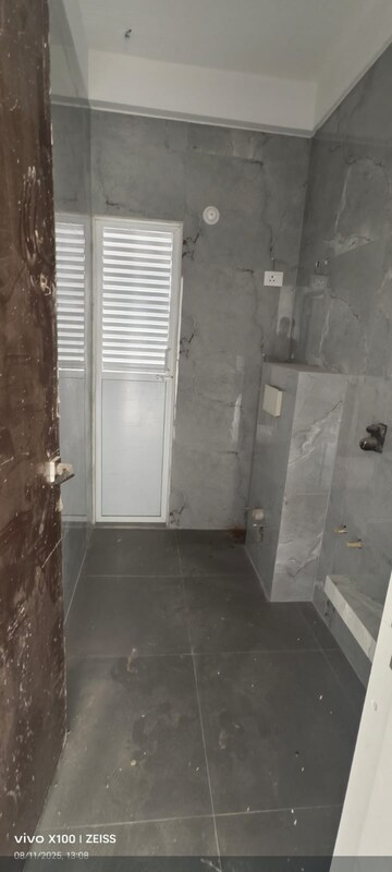 Bathroom in 2 BHK Apartment at Satyam Alliaance Icon, Ghansoli – for Rent