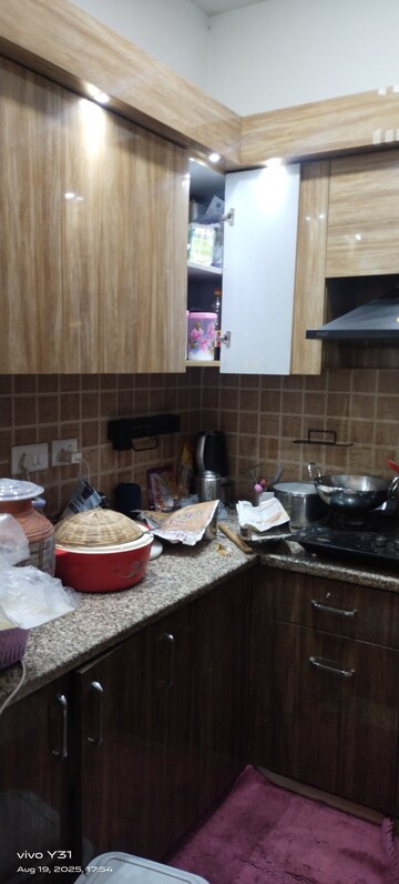 Kitchen in 2 BHK Apartment at Mahagun Mywoods, Sector 16c Greater Noida – for Rent