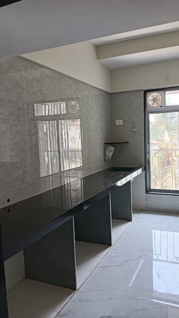 Kitchen in 2 BHK Apartment at Prerana CHS, Borivali West – for Sale