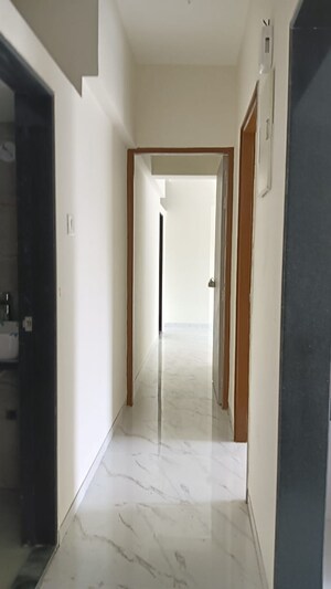 Building Lobby in 2 BHK Apartment at Prerana CHS, Borivali West – for Sale