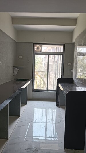 Living Room in 2 BHK Apartment at Prerana CHS, Borivali West – for Sale