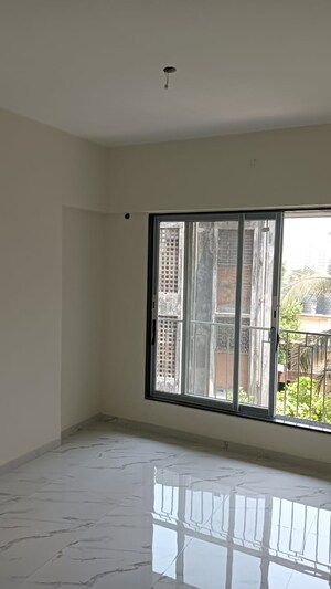 Room in 2 BHK Apartment at Prerana CHS, Borivali West – for Sale