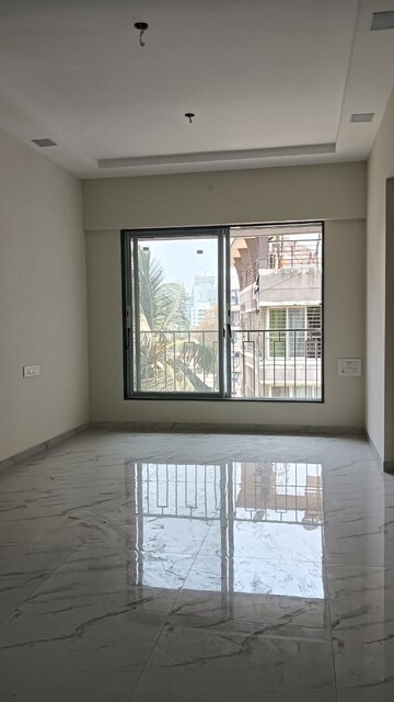 Room in 2 BHK Apartment at Prerana CHS, Borivali West – for Sale