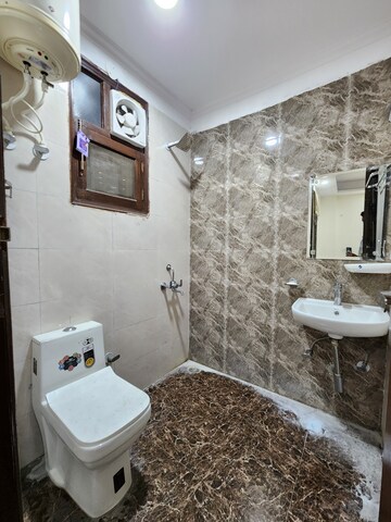 Bathroom in 2 BHK Builder Floor at Chattarpur – for Rent