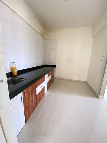 Kitchen in 2 BHK Apartment at Vision Indramegh, Tathawade – for Rent