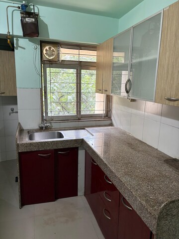 Kitchen in 2 BHK Apartment at Vasundhara CHS Manpada, Manpada – for Rent