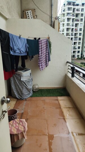 Living Room in 1 BHK Apartment at Solitaire Paradise, Wakad – for Sale