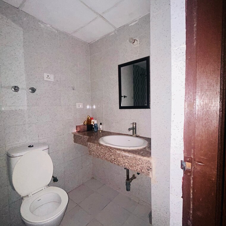 Bathroom, logix-blossom-greens 2 Bedroom 1040 Sq.Ft. Apartment In Sector 143 Noida 9086076