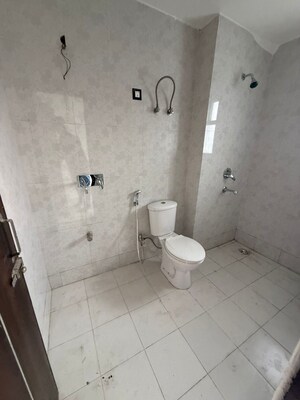 Bathroom in 3 BHK Apartment at Oxirich Avenue, Ahinsa Khand 2 – for Sale