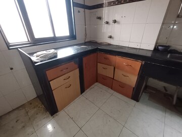 Kitchen in 2 BHK Apartment at JN Apartment, Vashi Sector 9 – for Rent