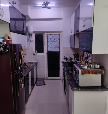 Kitchen in 2 BHK Apartment at Gardenia Golf City, Noida Central – for Rent
