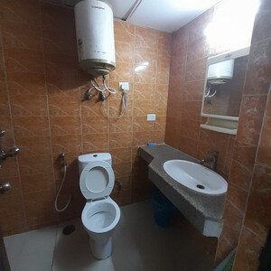 Bathroom in 2.5 BHK Apartment at Logix Blossom Greens, Sector 143 – for Sale