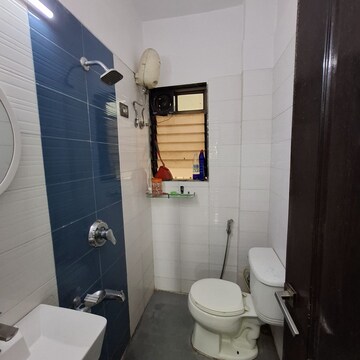 Bathroom in 1 BHK Apartment at RNA NG Suncity Phase III, Kandivali East – for Rent
