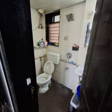 Bathroom in 1 BHK Apartment at RNA NG Suncity Phase III, Kandivali East – for Rent