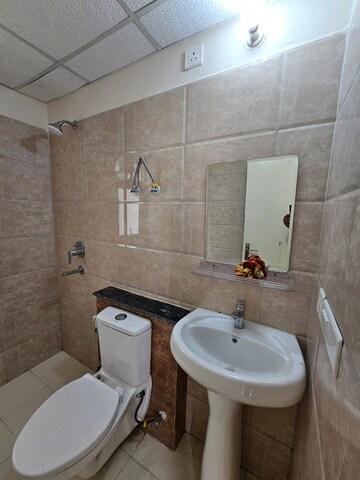 Bathroom in 2 BHK Apartment at Wave Executive Floors, Wave City – for Rent