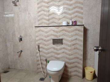 Bathroom in 3 BHK Apartment at Puravankara Purva Grande, Ashok Nagar – for Rent